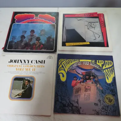 Sale Photo Thumbnail #110: Collection of four vintage vinyl LP albums, including titles by Johnny Cash, The 5th Dimension, The J. Geils Band, and Spooky Tooth, showing light cover wear.