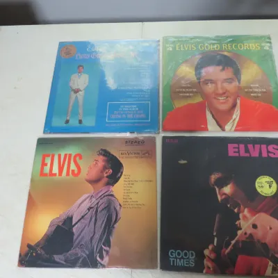 Sale Photo Thumbnail #136: Collection of four vintage Elvis Presley vinyl LP albums, including 'Elvis' Gold Records Volume 4' and 'Good Times', all preserved in plastic sleeves.