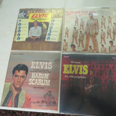 Sale Photo Thumbnail #139: Collection of four vintage Elvis Presley vinyl LP record albums, including 'Elvis for Everyone!', '50,000,000 Elvis Fans Can't Be Wrong', 'Harum Scarum', and 'From Elvis in Memphis'.