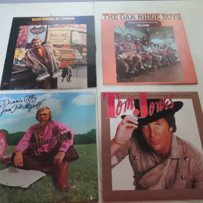 Sale Photo Thumbnail #94: Collection of four vintage vinyl LP albums, including titles by Buck Owens, The Oak Ridge Boys, Dennis Coffey, and Tom Jones.