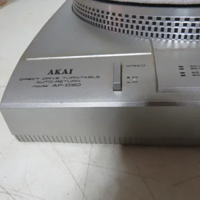 Sale Photo Thumbnail #135: Akai model AP-D30 auto-return direct drive turntable, featuring speed controls and a silver-finish plinth, circa late 1970s to early 1980s.