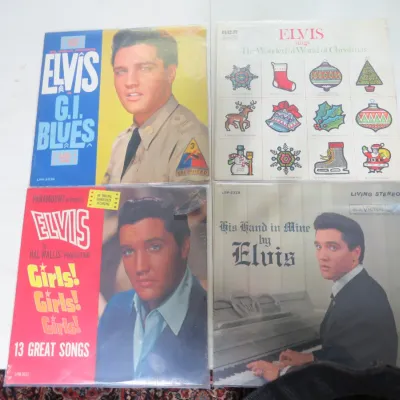 Sale Photo Thumbnail #143: Collection of four vintage Elvis Presley vinyl LP records in original protective sleeves, including G.I. Blues, Girls! Girls! Girls!, His Hand in Mine, and Elvis Sings The Wonderful World of Christmas.