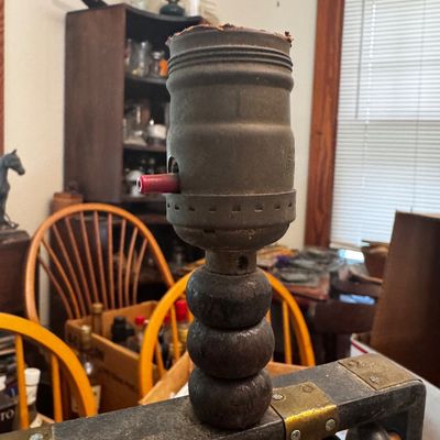 Sale Photo Thumbnail #30: Vintage electrical lamp socket mounted on a wooden abacus frame with brass corner brackets.