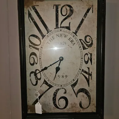 Sale Photo Thumbnail #6: Vintage-style rectangular wall clock featuring a distressed face with oversized Arabic numerals and 'The New Era Paris 1889' lettering in a black frame.