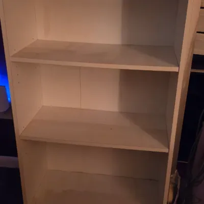 white book shelf (off site)