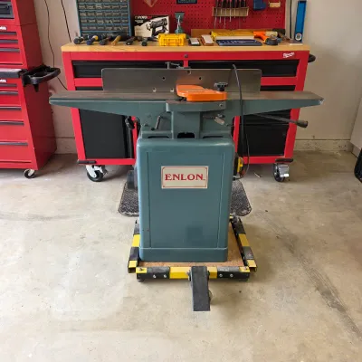 Sale Photo Thumbnail #89: Enlon woodworking jointer with fence and mobile base.