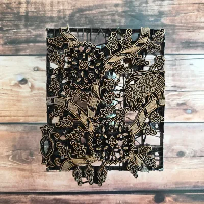 Sale Photo Thumbnail #14: Vintage metal textile-printing stamp with detailed bird and floral motifs.