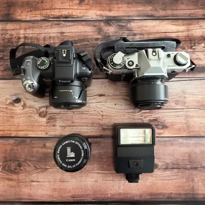 Sale Photo Thumbnail #13: Canon PowerShot SX10 IS digital camera, Canon 35mm film camera and flash.