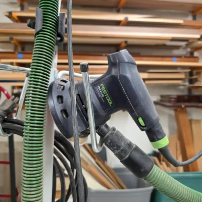 Sale Photo Thumbnail #79: Festool PRO 5 LTD random orbital sander with dust-extraction hose.