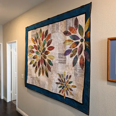 Sale Photo Thumbnail #192: Handmade floral appliqué wall quilt with multicolored petals and dark border.