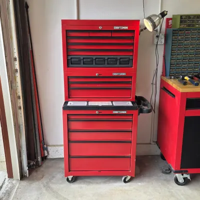Sale Photo Thumbnail #86: Craftsman rolling tool cabinet with stacked tool chests and drawer storage.
