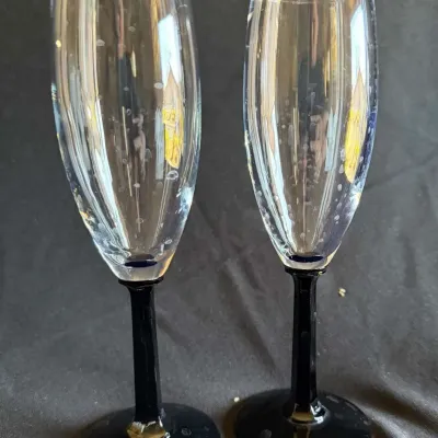Set of 2 Champagne Flutes with Black Stems and Round Black Bases, Clear Bubble-Flecked Glass, Cobalt