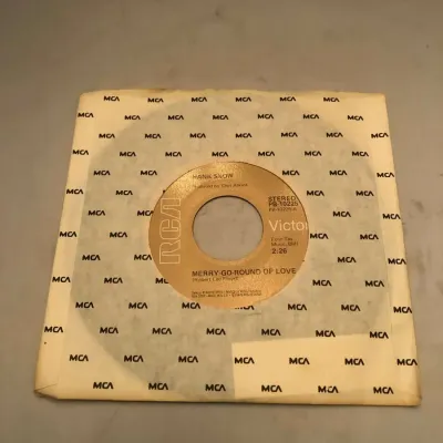 Hank Snow – “Merry-Go-Round of Love” / “My Filipino Rose” – RCA Victor Stereo 45, PB-10225