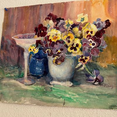 Sale Photo Thumbnail #154: Original watercolor still life painting depicting a bouquet of pansies alongside glassware, signed "A.D. Lang" in the lower right corner.