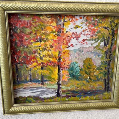 Sale Photo Thumbnail #171: Impressionist-style autumn landscape oil painting on canvas featuring vibrant fall foliage, presented in a molded gold-tone frame.