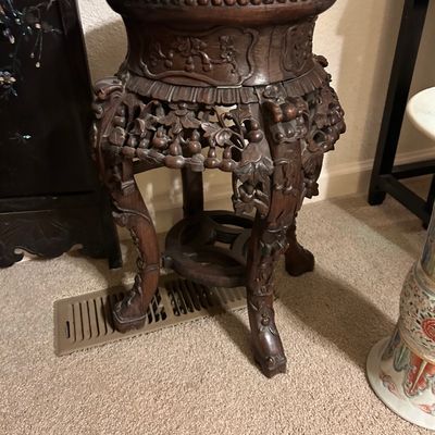 Sale Photo Thumbnail #98: Intricately hand-carved Chinese dark hardwood plant stand with a inset marble top and reticulated floral aprons.