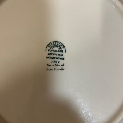 Sale Photo Thumbnail #35: Underside maker's mark on a Pillivuyt France porcelain dish, indicating Modèle Déposé 1901 Décor Spécial.