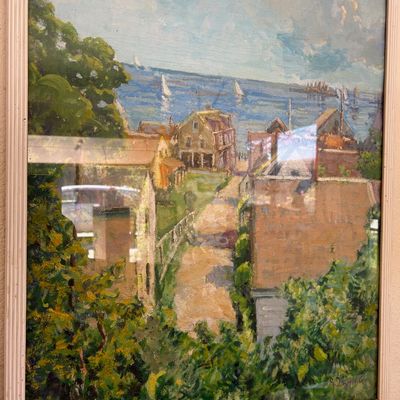 Sale Photo Thumbnail #158: Framed impressionist oil painting depicting a coastal village with sailboats on the water, signed by artist in lower right.