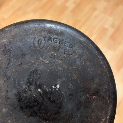 Sale Photo Thumbnail #32: Vintage Wagner Ware cast iron waffle iron base showing the stylized logo, Sidney, Ohio mark, and size number 8.
