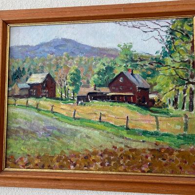 Sale Photo Thumbnail #174: Framed impressionistic landscape oil painting depicting a rural farmstead with red buildings and mountains in the background, set in a molded wooden frame.