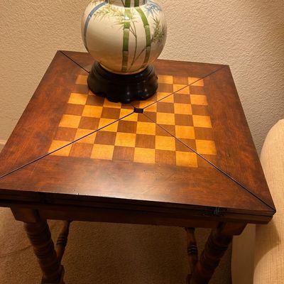 Sale Photo Thumbnail #91: Vintage square games table with a checkered wood inlay top and turned legs, topped with an Asian-style ceramic bamboo lamp.