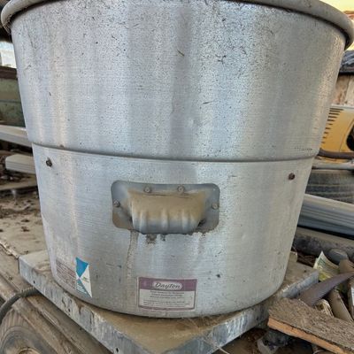 Sale Photo Thumbnail #133: Dayton commercial power roof ventilator fan unit with an aluminum housing.