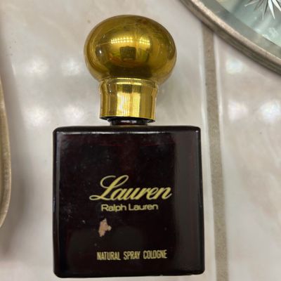 Sale Photo Thumbnail #50: Vintage Lauren Ralph Lauren natural spray cologne in classic dark red glass bottle with a round gold-tone cap.