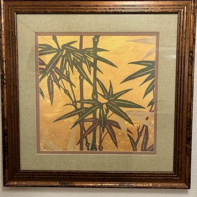 Sale Photo Thumbnail #45: Framed Asian-style botanical art print featuring bamboo stalks and leaves against a textured gold background, presented in a bronze-toned molded frame with a sage green mat.