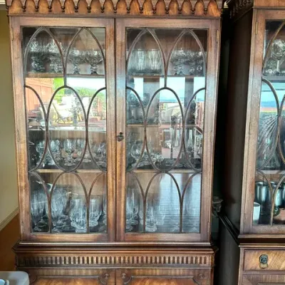 Sale Photo Thumbnail #30: Gothic Revival style mahogany china cabinet featuring cathedral arch glass doors and intricate crown molding.