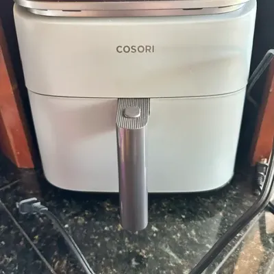 Sale Photo Thumbnail #22: Cosori digital air fryer in light gray with a dark control panel, sitting on a granite countertop.