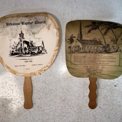 Sale Photo Thumbnail #138: Vintage hand fans featuring Urbanna Baptist Church and Page Drug Co. advertisements.