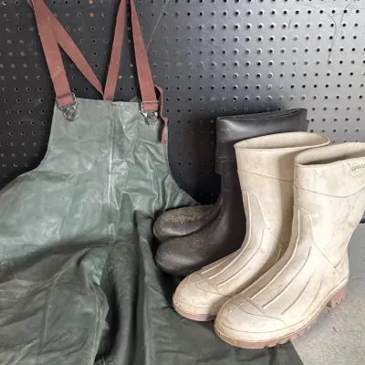 Sale Photo Thumbnail #164: Rubber waders and work boots.