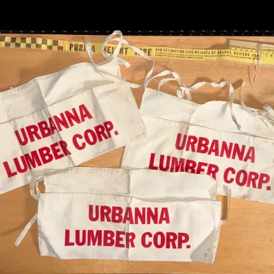 Sale Photo Thumbnail #179: Urbanna Lumber Corp. canvas waist aprons and a Purina weight tape.