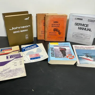 Sale Photo Thumbnail #149: Collection of vintage outboard and marine engine service manuals.