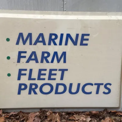 Sale Photo Thumbnail #33:  advertising sign reading 'Marine Farm Fleet Products'