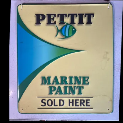 Sale Photo Thumbnail #159: Pettit Marine Paint embossed metal advertising sign