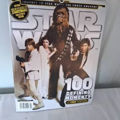 Official Lucasfilm Collector's Edition Star Wars magazine, titled "100 Defining Moments," featuring Luke Skywalker,...