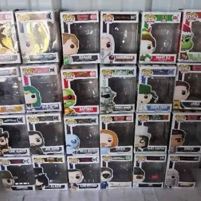 Collection of boxed Funko Pop! vinyl figures stacked in four rows, featuring pop culture characters from Lord of the Rings, Silicon...
