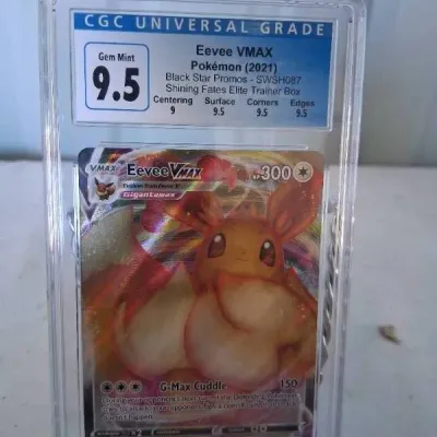 CGC-graded 9.5 Gem Mint 2021 Pokémon Eevee VMAX Black Star Promo card (SWSH087).