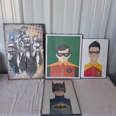 Collection of four framed DC Comics superhero wall art pieces, including a distressed Justice League canvas and three minimalist graphic...
