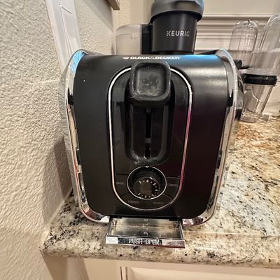 Sale Photo Thumbnail #46: Black & Decker 2-slice toaster with chrome trim and bagel, frozen, and reheat settings.