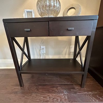 Sale Photo Thumbnail #63: Dark brown contemporary console table with two drawers, cross-brace side supports, and a lower shelf.