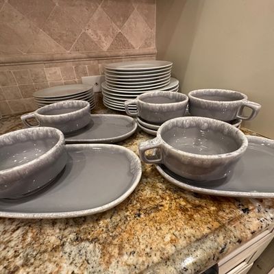 Sale Photo Thumbnail #34: Mid-century modern style gray ceramic soup and sandwich set with matching stacked plates. Features a drip glaze rim pattern on the handled bowls and teardrop-shaped trays.