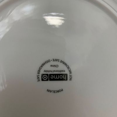 Sale Photo Thumbnail #116: Maker's mark on the underside of a Target 'Home' brand porcelain 'traditional holiday' plate, indicating dishwasher safe and made in China.