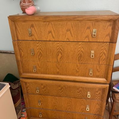Sale Photo Thumbnail #107: Vintage oak chest on chest dresser with brass bail handles.