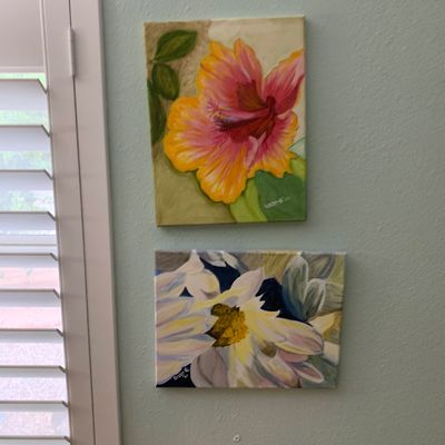 Sale Photo Thumbnail #120: Pair of signed contemporary floral acrylic paintings on stretched canvas featuring a pink and yellow hibiscus and white flowers.