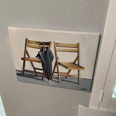 Sale Photo Thumbnail #68: Framed canvas painting featuring a contemporary still life of two wooden folding chairs and a black umbrella, signed by the artist in the lower right corner.