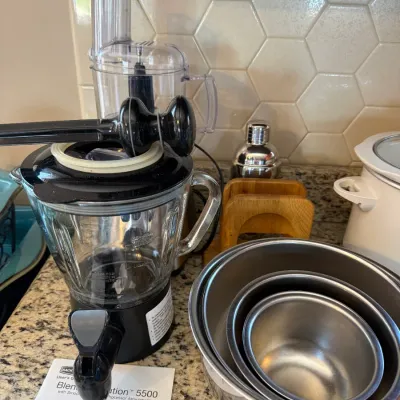 Back to Basics Blend 'N Break/Smoothie Revolution 5500 blender with food processor attachment and manual, displayed alongside nested...