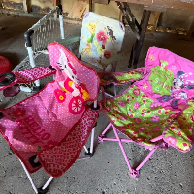 Sale Photo Thumbnail #29: Collection of children's folding lawn chairs featuring Hello Kitty, Minnie Mouse, and Disney Fairies character graphics.