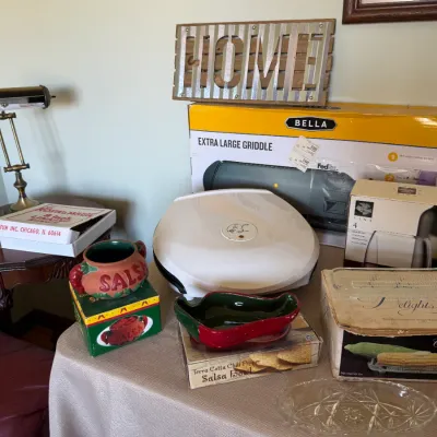 Collection of kitchenware and home decor, including a Bella extra-large griddle in box, George Foreman grill, salsa and chili pepper...